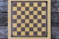Chess board on an old table in a public park Royalty Free Stock Photo