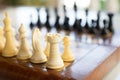 Chess board set up and ready to play. Narrow depth of field Royalty Free Stock Photo