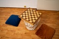 chess board on small table with two cushions on the apartment floor Royalty Free Stock Photo