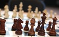 Chess boards on tables during Chess Championship. The tournament. Chess board with white, black pieces and clock on desk. Plan lea