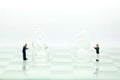 Chess business with miniature people : businessman idea for com