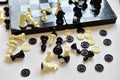 Chess and checkers lie on the chessboard and nearby. Royalty Free Stock Photo