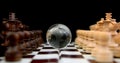 Chess figures against earth globe Royalty Free Stock Photo