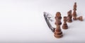 Chess figures with eyeglasse on white background