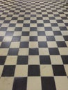 Chess floor. Flooring from black and white tiles Royalty Free Stock Photo