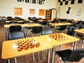 Chess game with black and white wooden chips on wooden board. Realistic. Strategy, Management or Leadership Concept