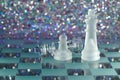 Chess with game pieces made of glass, queen, king, pawn and game board made of glass Royalty Free Stock Photo