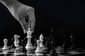 Chess with games of business. Businessman holding leader for fight Royalty Free Stock Photo