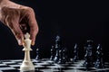 Chess with games of business. Businessman holding leader for fight Royalty Free Stock Photo