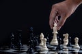 Chess with games of business. Businessman holding leader for fight Royalty Free Stock Photo