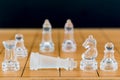 Chess glass on a wood chessboard