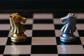 Chess horse knights against each other on board Royalty Free Stock Photo