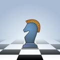 Chess knight on checkered floor