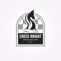 chess knight logo design emblem. vector vintage illustration of horse on chess board Royalty Free Stock Photo