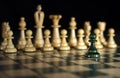 Chess: one against all, attack on power out of focus Royalty Free Stock Photo