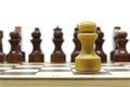 Chess, lone white pawn against enemies. Shallow DOF, focus on white pawn. Isolated on white Royalty Free Stock Photo