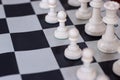 Chess opening with close-up on pawns.