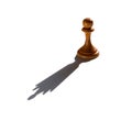 A chess pawn casting a queen piece shadow