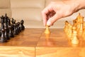 A chess pawn in a human hand. The beginning of the chess game. T Royalty Free Stock Photo