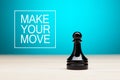 Chess pawn with make your move message on the background. Strategy, motivation and taking action in business