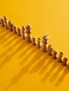 Chess piece parade ceremony on yellow background Royalty Free Stock Photo