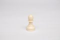 Chess piece white pawn on a white background Royalty Free Stock Photo