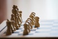 Chess pieces on the chess board with selective focus and crop fragment. Business and motivation concept