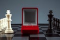 Chess pieces on a chessboard and a box with a golden ring, game. The concept of confrontation, career, competition, startup, truce Royalty Free Stock Photo