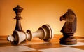 Chess pieces on a chessboard. Game of chess. Mat to the king Royalty Free Stock Photo