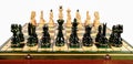 Chess pieces before the game. Chess board on the table Royalty Free Stock Photo