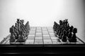 Chess pieces before the game. Chess board on the table Royalty Free Stock Photo