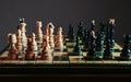 Chess pieces before the game. Chess board on the table Royalty Free Stock Photo