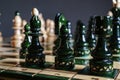 Chess pieces before the game. Chess board on the table Royalty Free Stock Photo