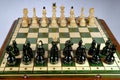 Chess pieces before the game. Chess board on the table Royalty Free Stock Photo