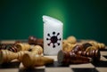 Chess pieces lying on a chessboard, killed by a corona virus Royalty Free Stock Photo