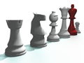 Chess pieces with red king