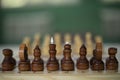 Chess pieces on table. Chess Tournament. Ancient Strategy