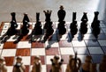 Chess pieces on a table in the park Royalty Free Stock Photo
