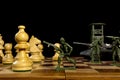 Chess pieces and toy soldiers