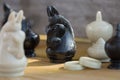 Chess pieces on wooden table, Planing game. chess uniqueness concept on the wooden background Royalty Free Stock Photo