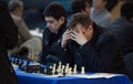 Chess players during gameplay at a local tournament detail