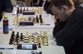 Chess players during gameplay at a local tournament