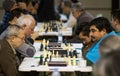 Chess players during a local tournament wide