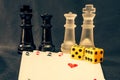 Chess set, cards, and dice make a set of hobby games Royalty Free Stock Photo