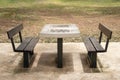 Chess table with benches in the park