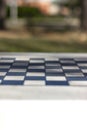 Chess table in a public park Royalty Free Stock Photo