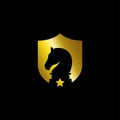 Chess vector logo with knight horse a shield. fit for chess club game logo template. gold color Royalty Free Stock Photo