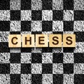 Chess, word on wooden blocks, on a chessboard. Concept for a chess club, school, competition. Chess. Sport.