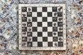 Chessboard against the background of money, strategy concept