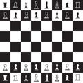 Chessboard with black and white chess pieces Royalty Free Stock Photo